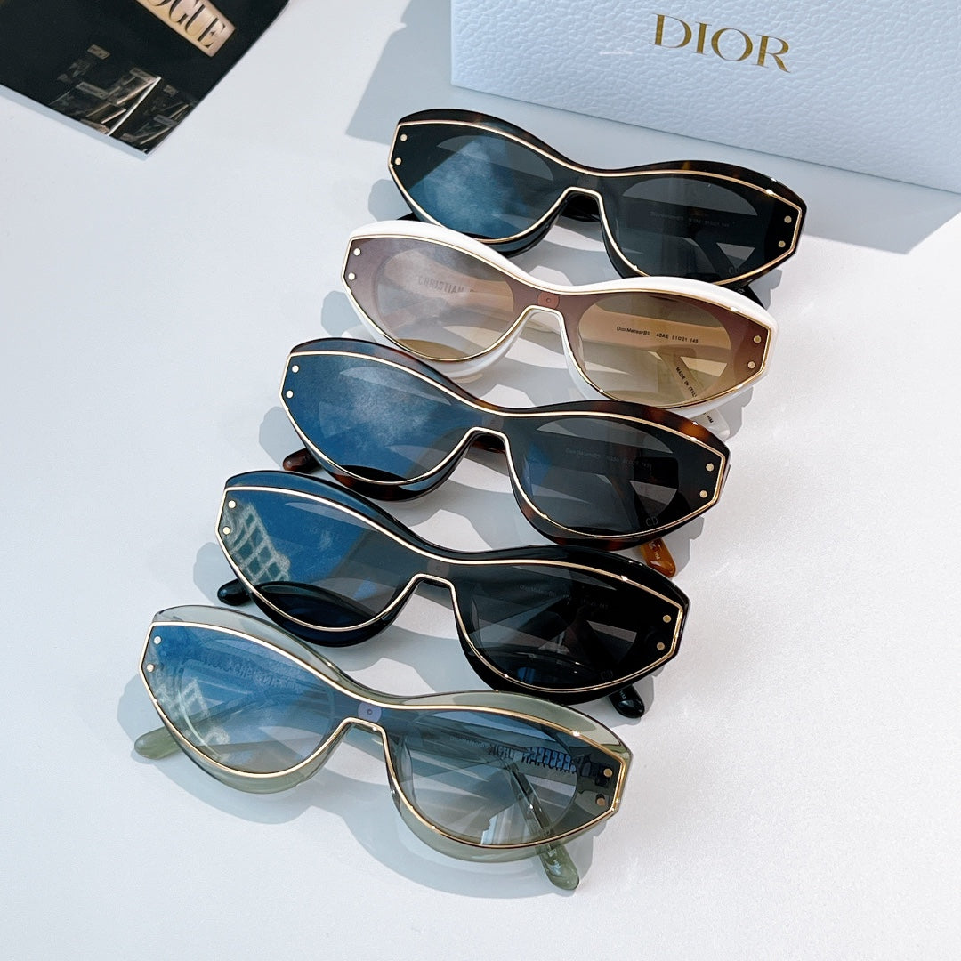 Stack of four sunglasses with mixed frames and tinted lenses