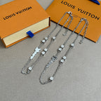 Set of silver chain necklaces with square charms and Louis Vuitton logo script