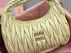 MiuMiu ruched mini hobo bag pale yellow leather with front logo detail
