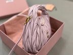 Lavender mini ruched handbag with braided strap and gold-tone chain accents