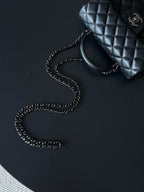 Chanel quilted leather mini bag with chain strap detail, black
