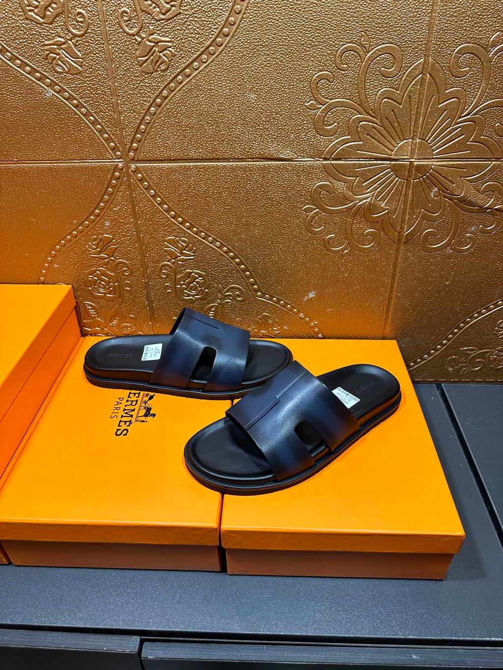 Hermes dark blue slide sandals with two straps and textured footbed