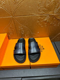 Hermes dark blue leather slide sandals with wide cross strap and open toe