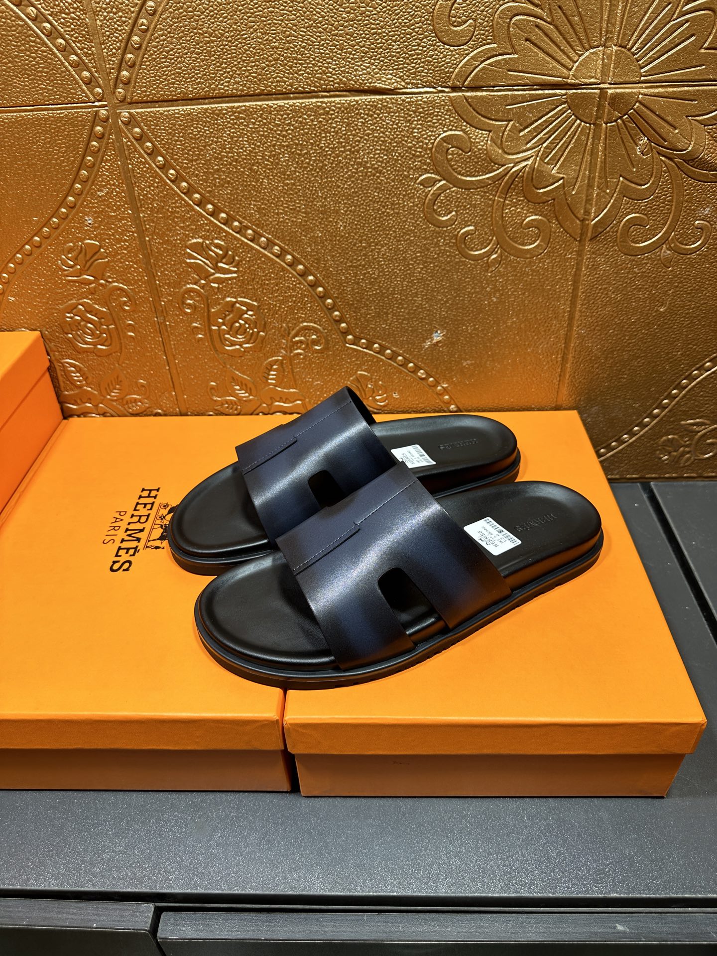 Hermes dark blue slide sandals with two wide straps and cushioned footbed