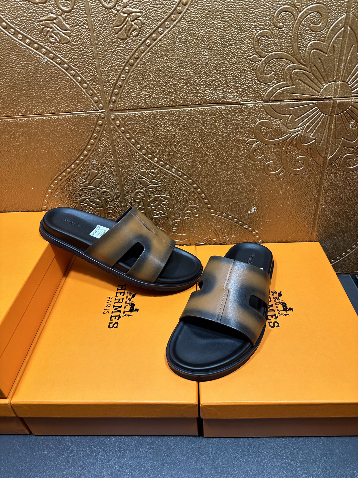 Hermes slide sandals, gray-tan wide straps on black soles