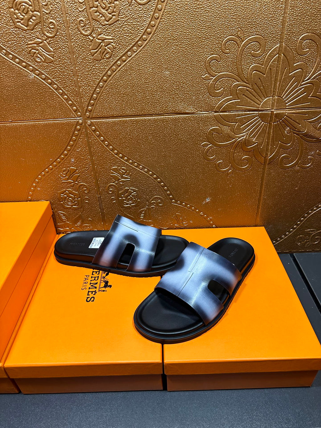 Hermes slide sandals, metallic blue upper with black strap detail and sole