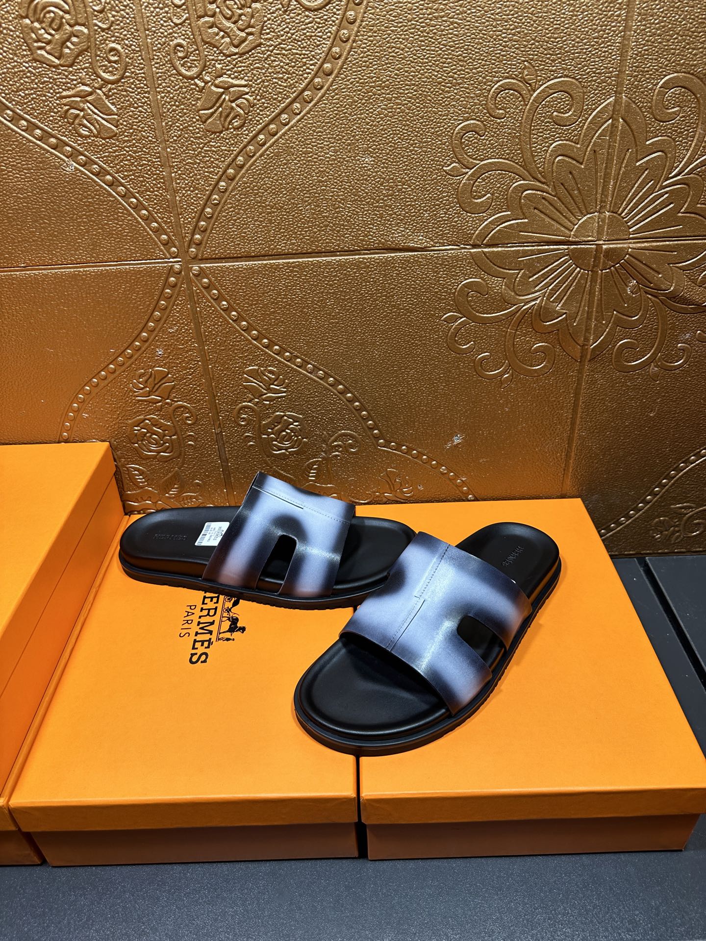 Hermes slide sandals, metallic blue upper with black strap detail and sole