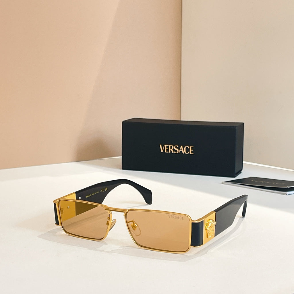 Versace rectangular sunglasses with amber lenses and champagne-gold frames, dark temples