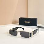 Versace rectangular sunglasses with dark lenses and gold frames, black temple accents
