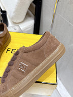 Brown suede sneaker with square side logo plate, fuzzy laces and contrast stitching