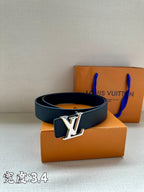 Louis Vuitton belt with dark blue strap and gold-tone LV emblem buckle
