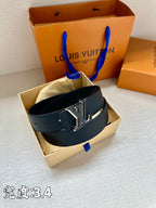 Louis Vuitton leather belt, dark blue strap with gold-tone LV buckle