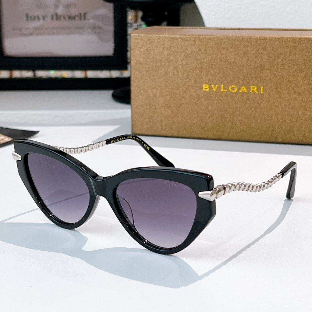 Cat-eye sunglasses with black frames, silver chain temples, dark purple lenses