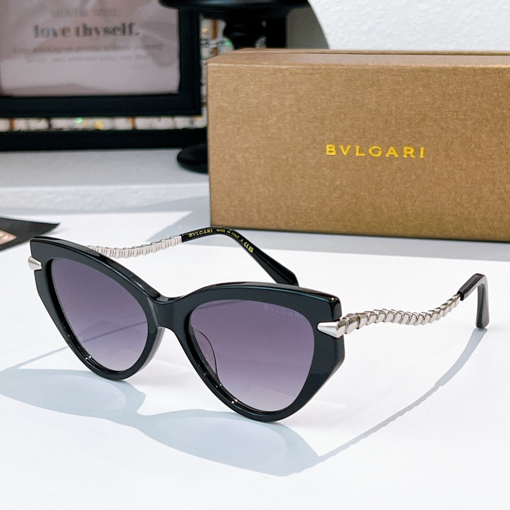 Cat-eye sunglasses with black frames, silver chain temples, purple-tinted lenses