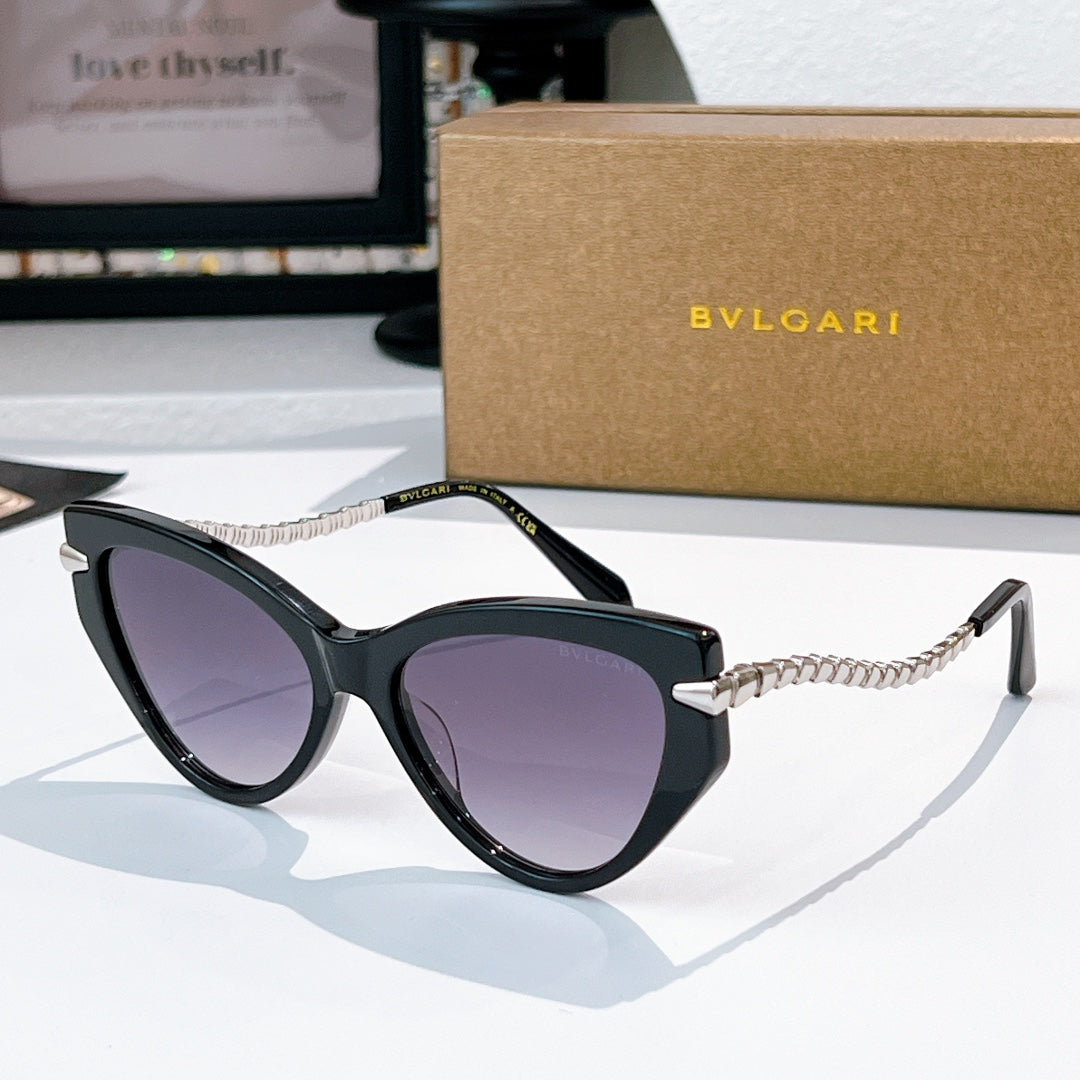 Cat-eye sunglasses with black frames, silver chain temples, purple-tinted lenses