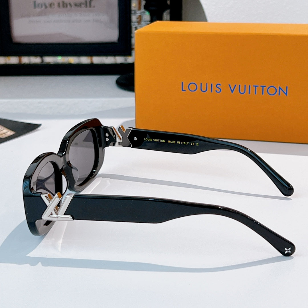 Louis Vuitton sunglasses, black frame with gold logo emblem and angular temple arms