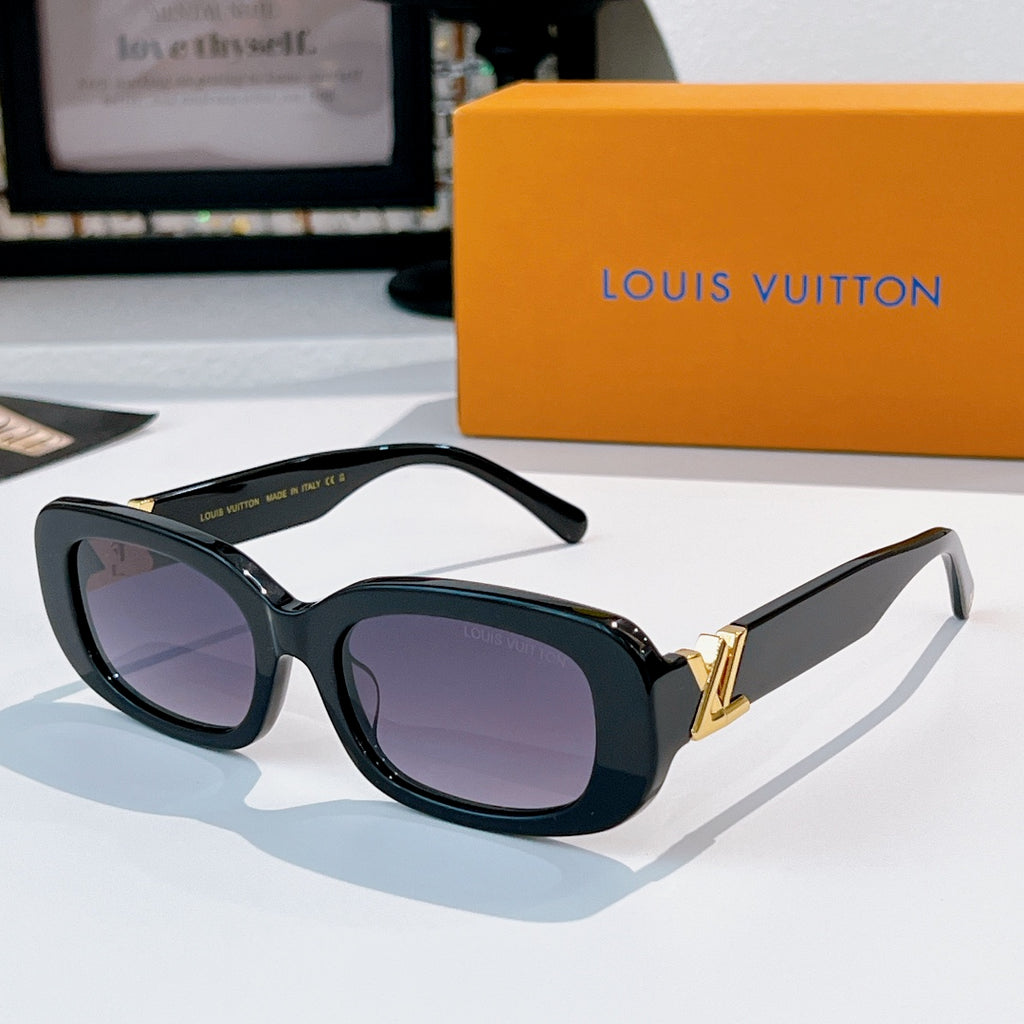 Louis Vuitton sunglasses with dark frame and purple-tinted gradient lenses, gold logo hinges