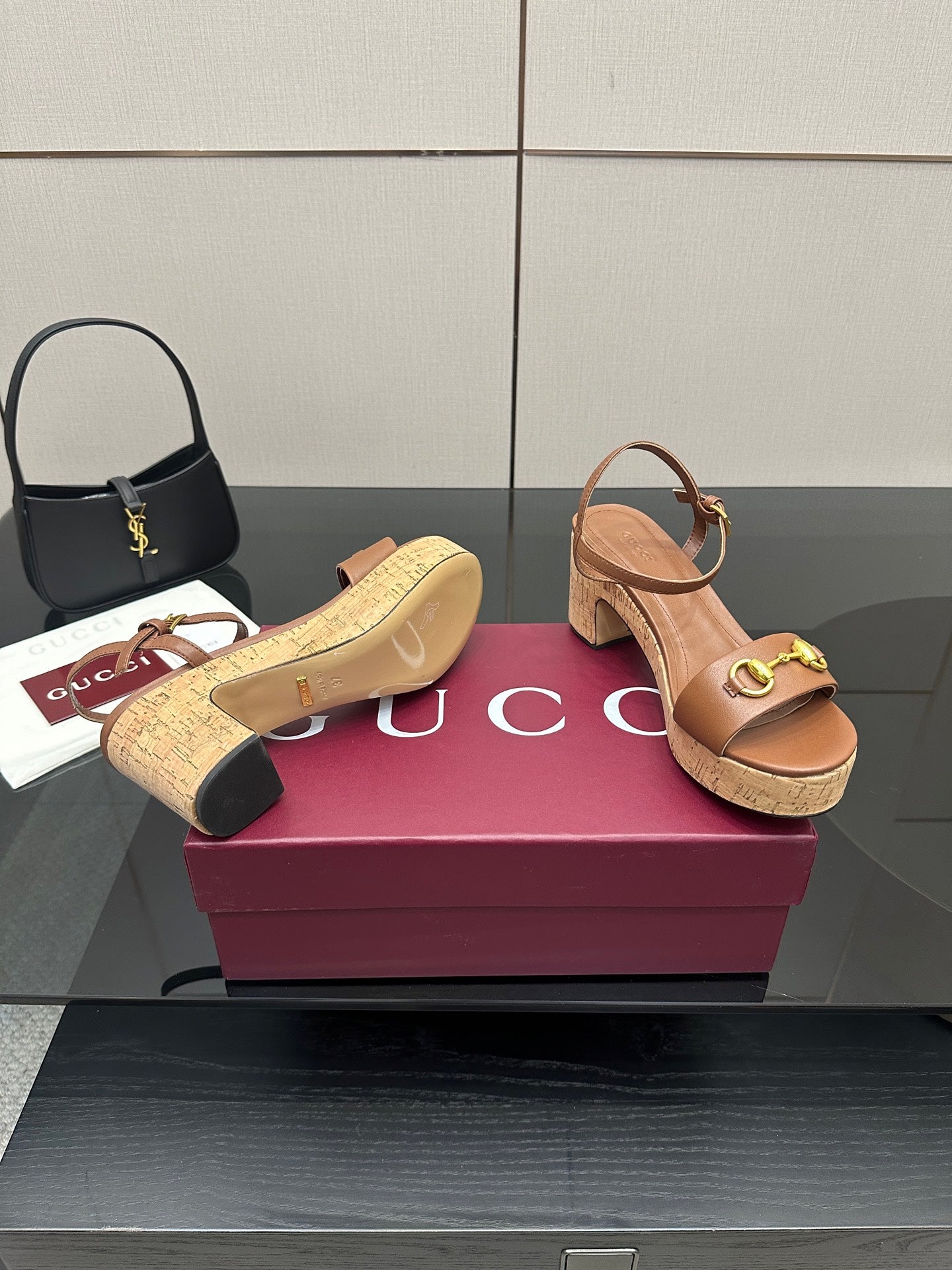 Gucci ladies tan platform heeled sandals with gold buckle straps and cork-style sole