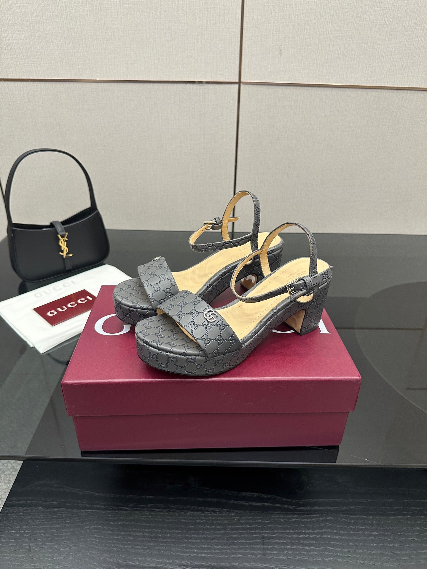 Gucci ladies platform heeled sandals in gray monogram canvas with ankle strap