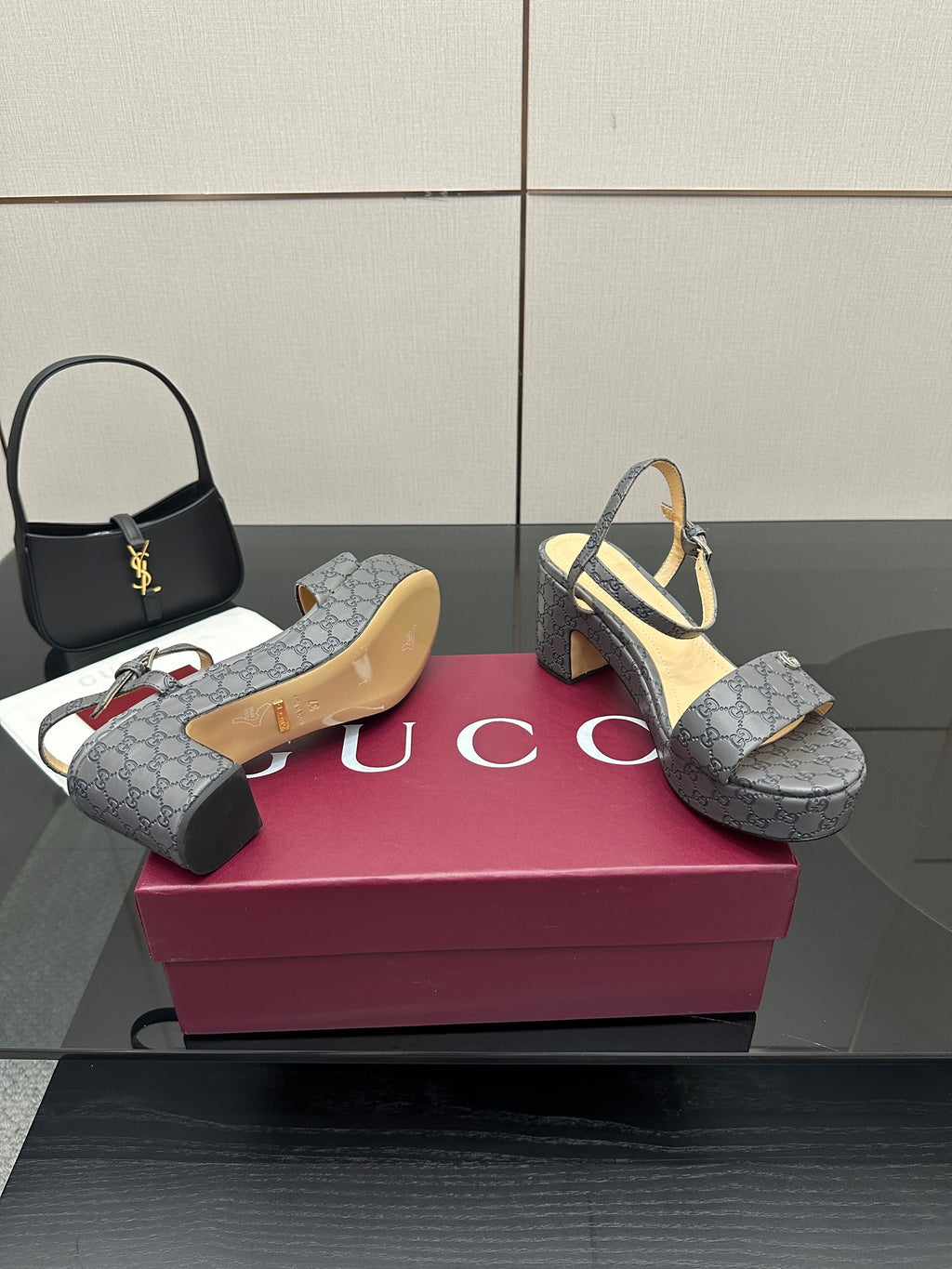 Gucci ladies platform heeled sandals in gray monogram canvas, side view on box