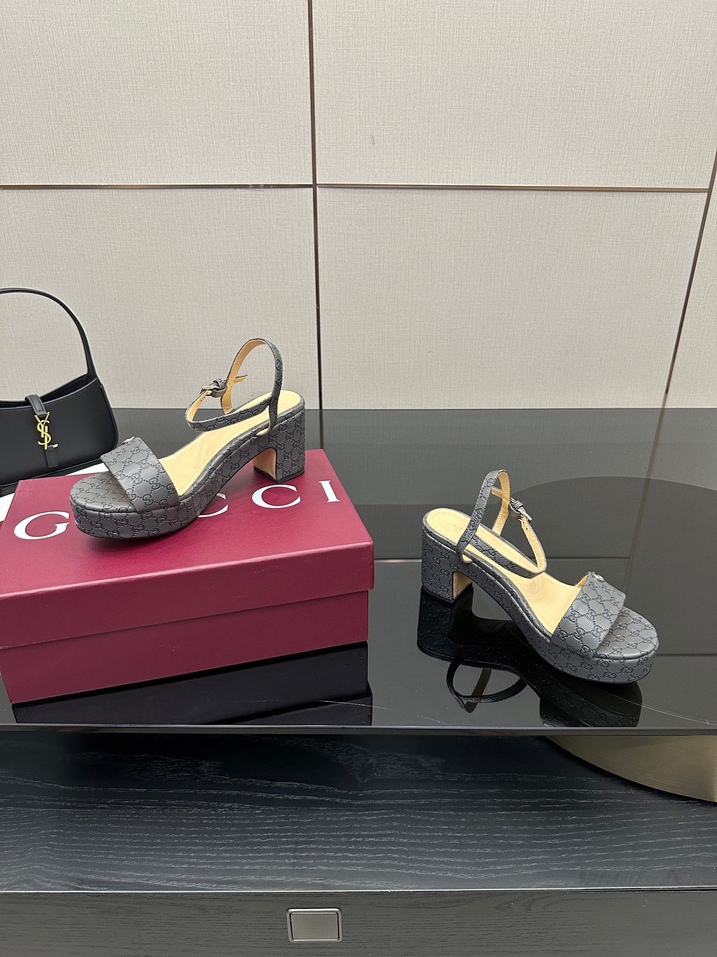 Gucci ladies platform heeled sandals in gray monogram canvas, front and side view