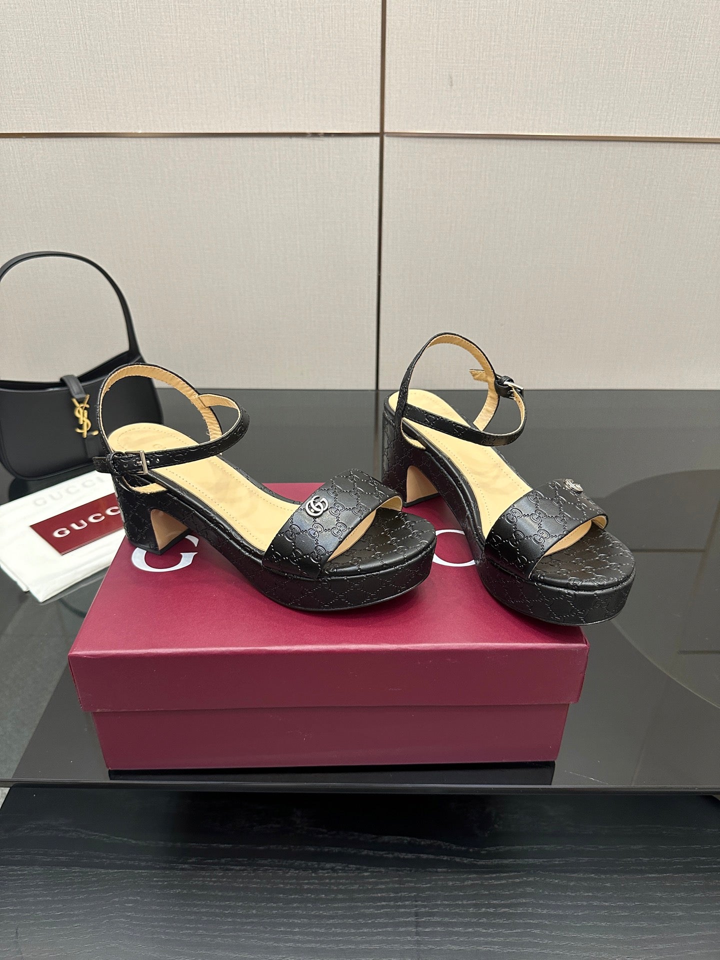 Gucci black platform sandals with ankle strap and block heel, GG logo finish