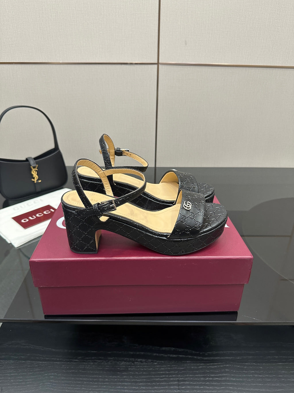 Gucci black platform sandals with ankle strap and thick heel, GG monogram finish