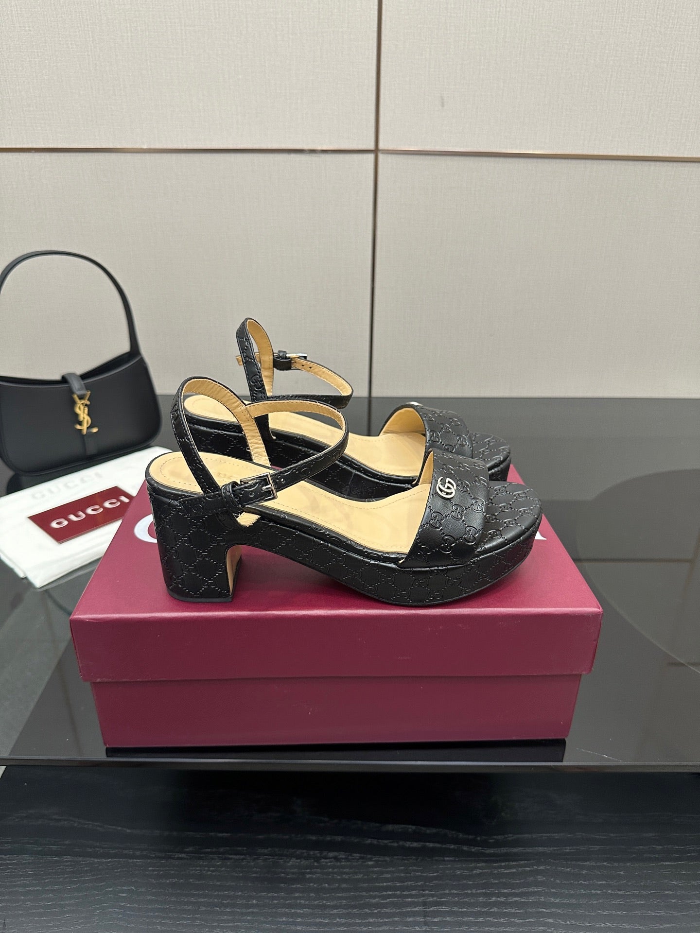 Gucci black platform sandals with ankle strap and thick heel, GG monogram finish
