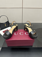 Gucci black heeled sandals with ankle strap, GG monogram texture on straps
