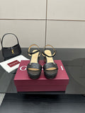 Gucci black platform sandals with ankle strap and textured GG logo pattern