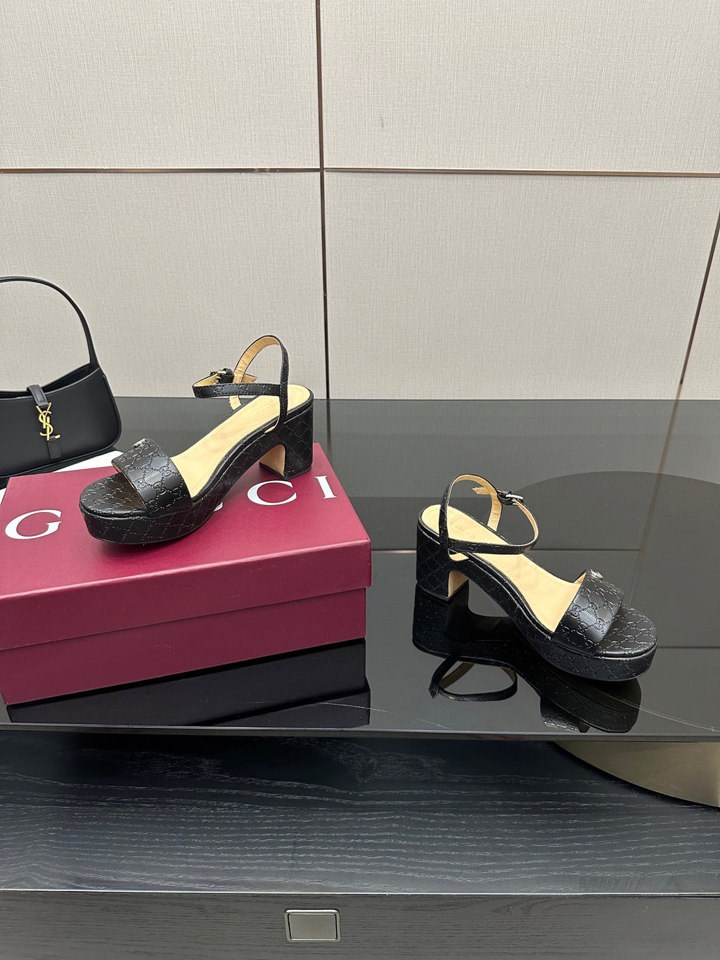 Gucci black platform sandals with ankle strap and GG logo patterned straps