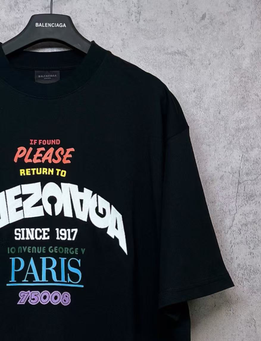 Black T-shirt with close-up front graphic print in multicolor