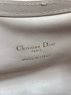 Dior Made in Italy text on pale pink leather lining