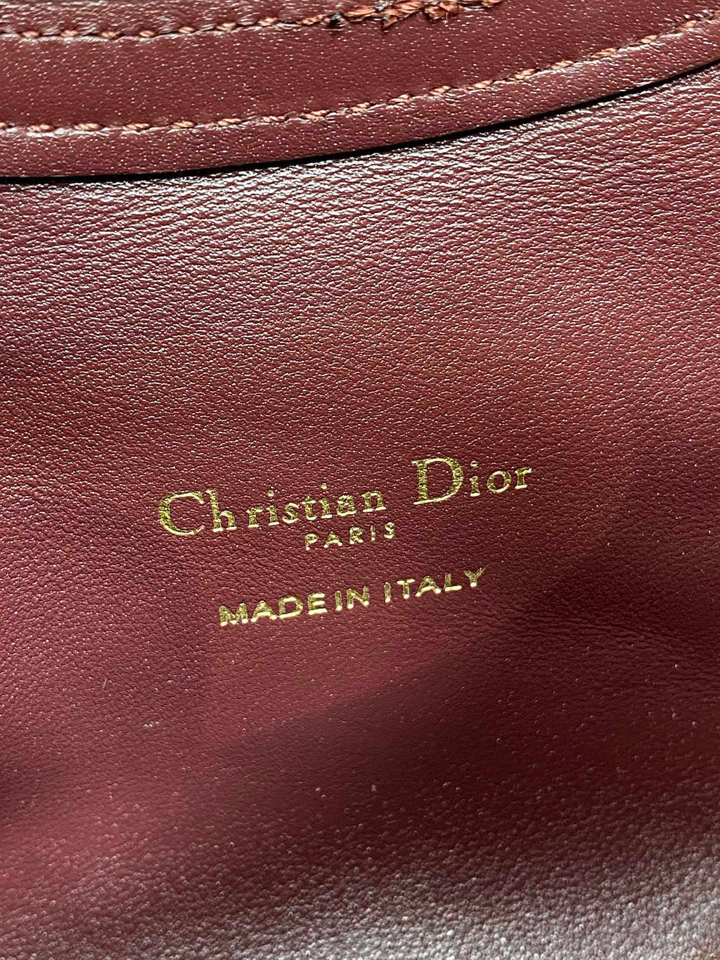 Maroon leather Dior Paris logo and Made in Italy stamp