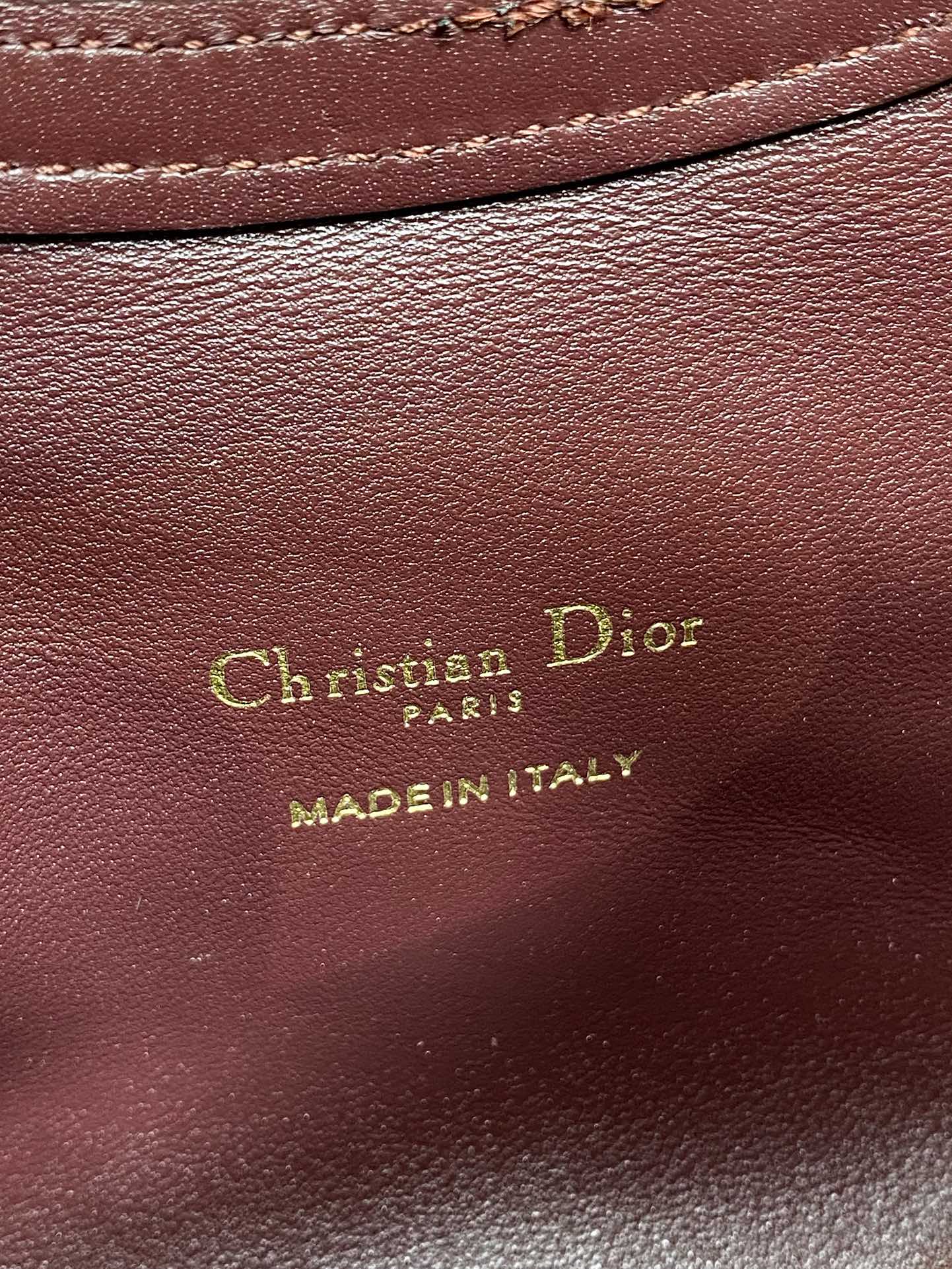 Maroon leather Dior Paris logo and Made in Italy stamp