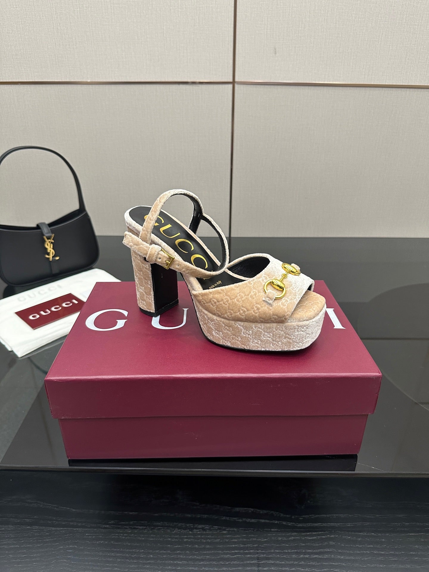 Beige and gold textured platform sandals with chunky heel, sling straps, and gold accents