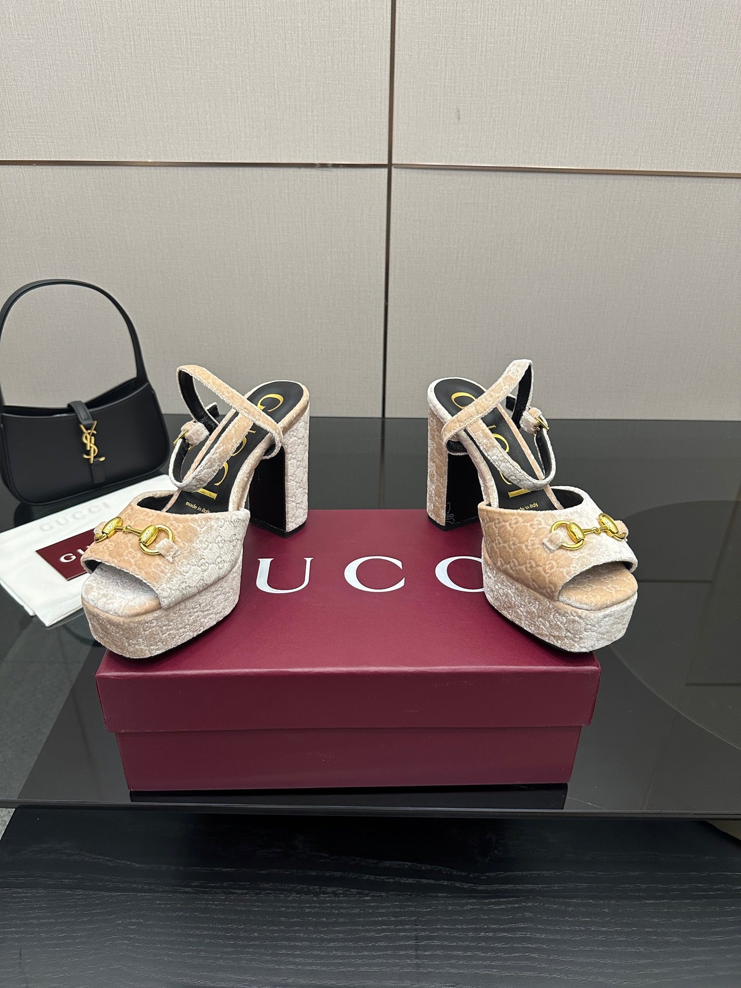 Beige and gold platform sandals with thick block heels and gold buckle sling straps