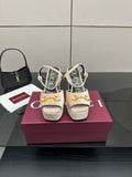 Beige and gold platform sandals with chunky heels, sling straps, and gold buckle accents