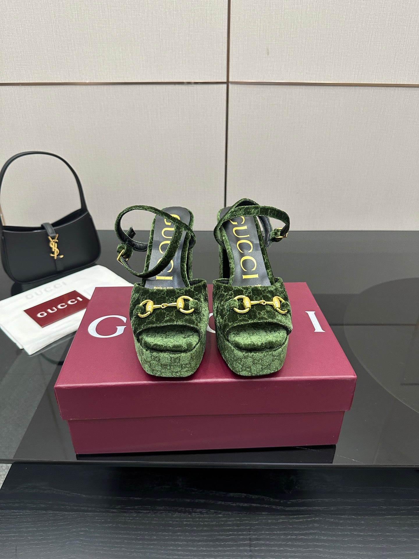 Gucci ladies green patterned platform heels with ankle straps and gold-tone hardware