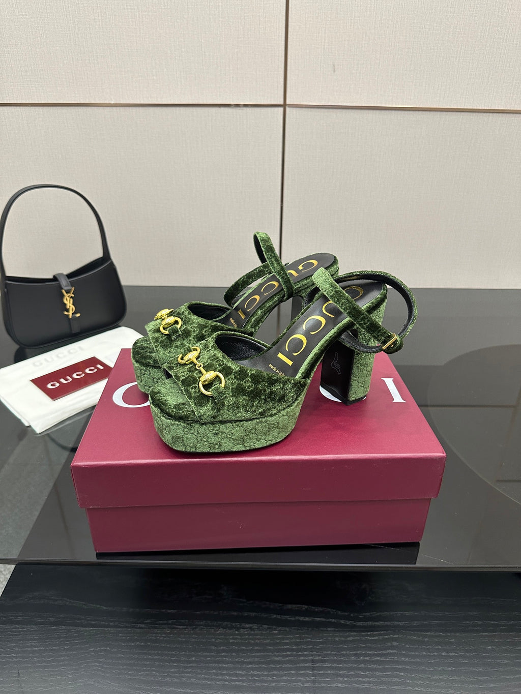 Gucci ladies green patterned platform heels, side view with gold-tone hardware
