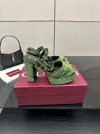 Gucci ladies green patterned platform heels with ankle straps and black chunky heel