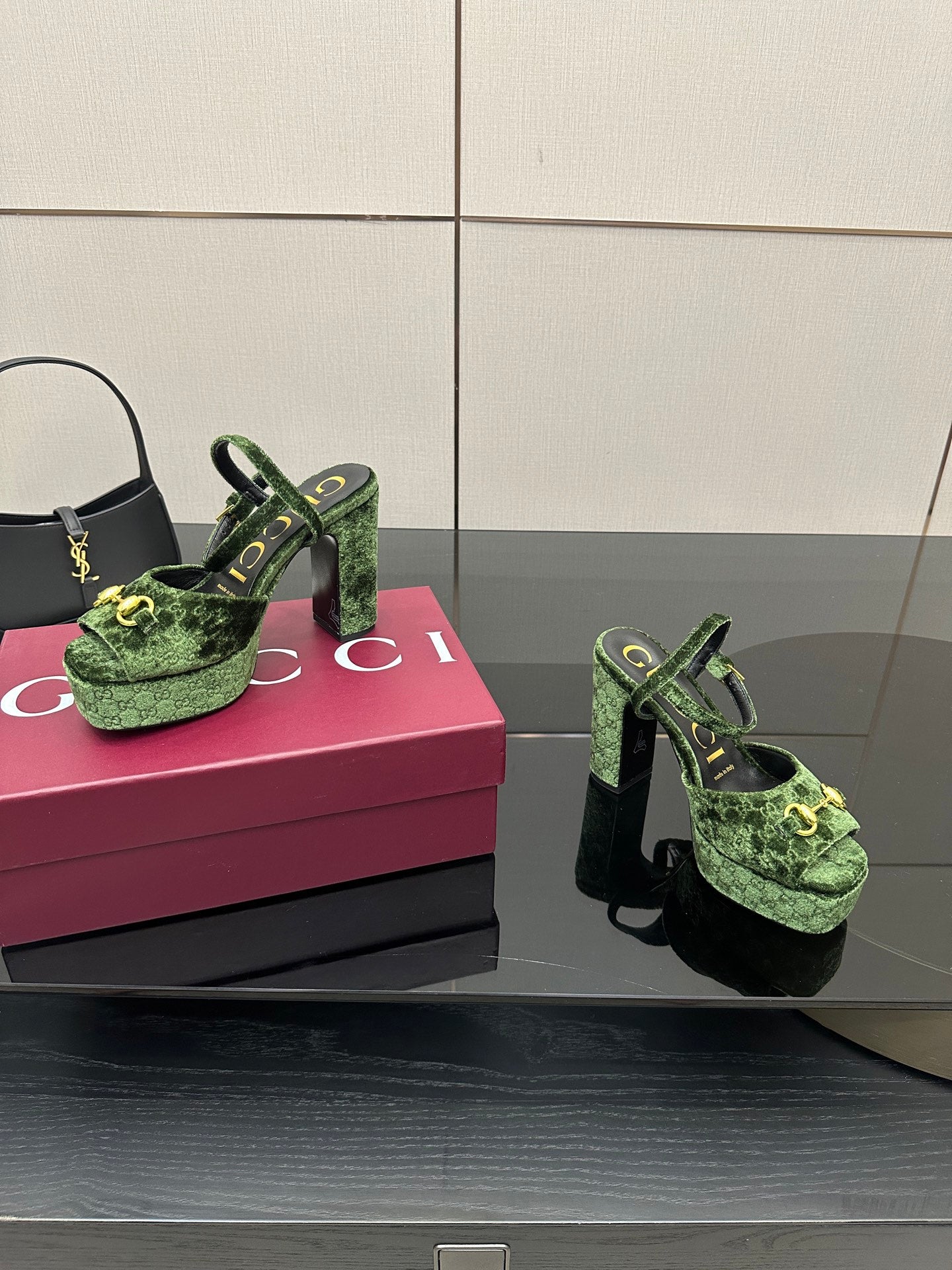 Gucci ladies green patterned platform heels, side view showing thick black heel