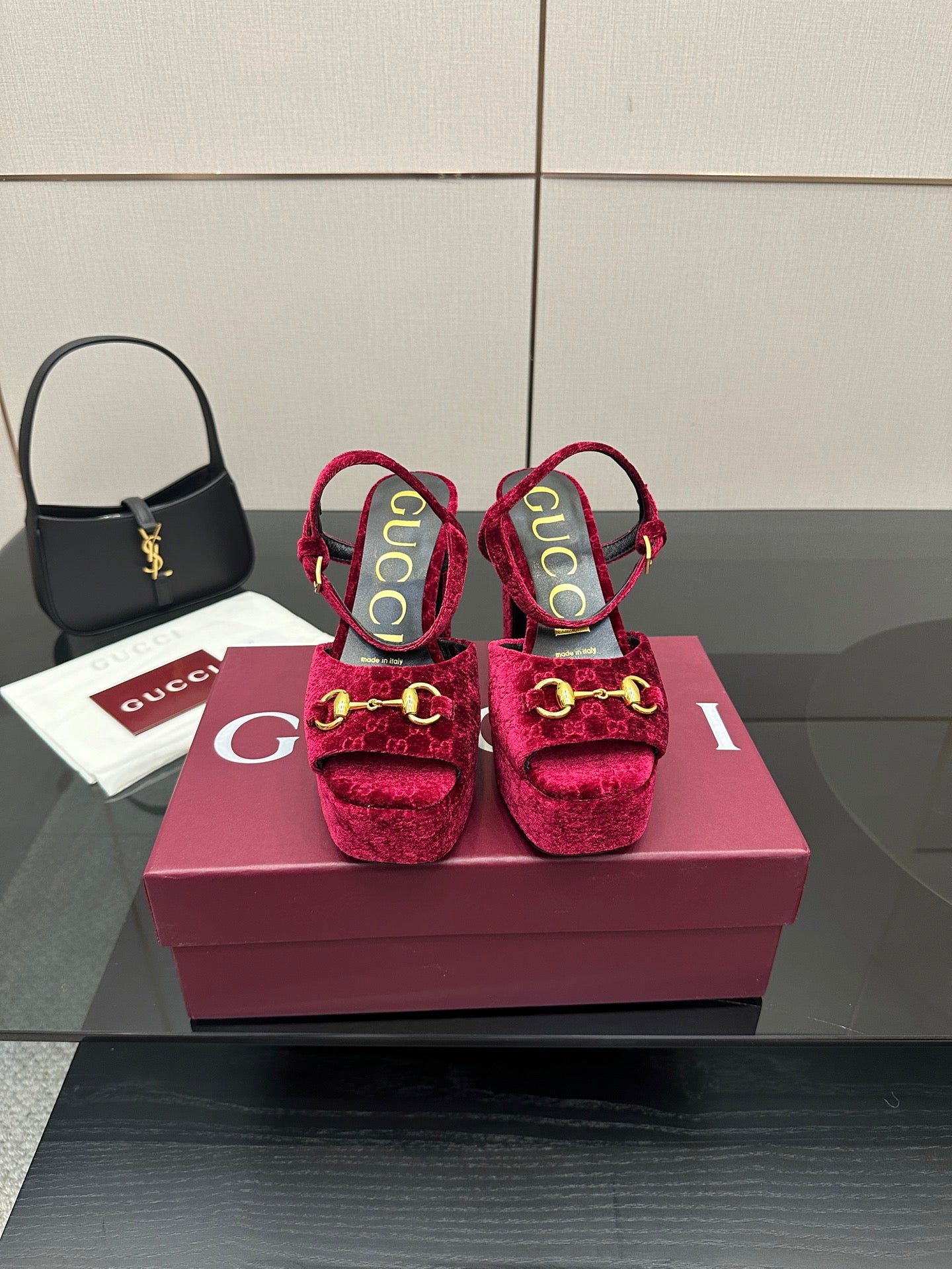 Red velvet platform heels with gold buckle detail, block heel, and ankle strap