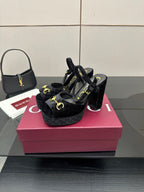 Gucci women’s black velvet heeled mules with gold buckle accents and block heel