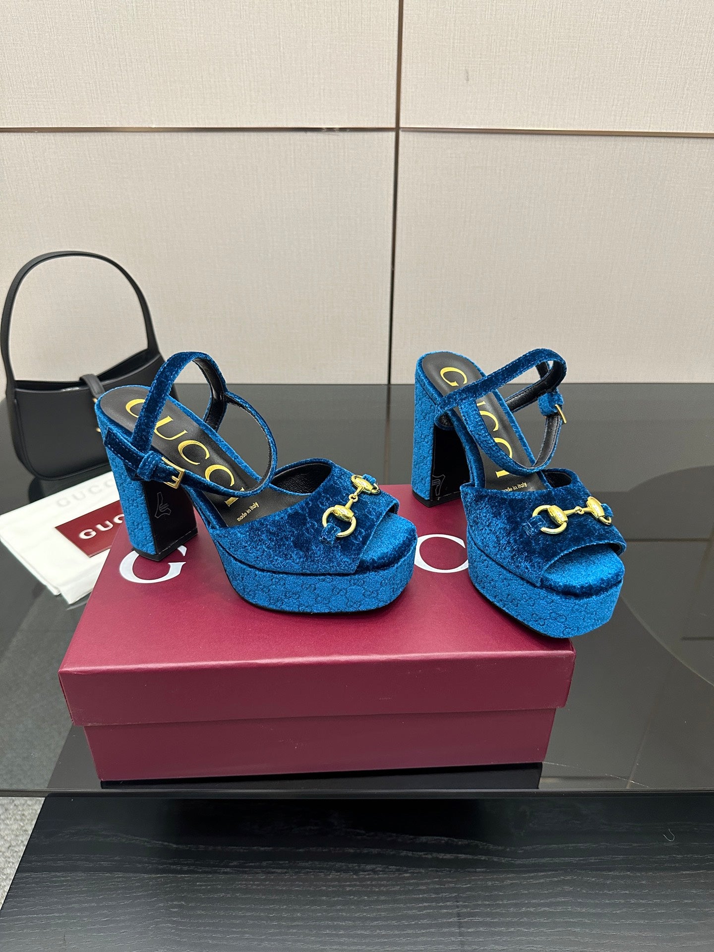 Gucci blue velvet platform heeled sandals, side view with gold horsebit detail