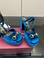Gucci blue velvet platform heeled sandals, close-up of gold horsebit and strap