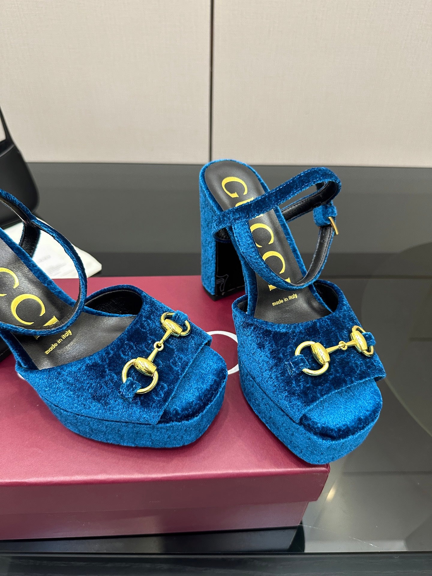 Gucci blue velvet platform heeled sandals, close-up of gold horsebit and strap