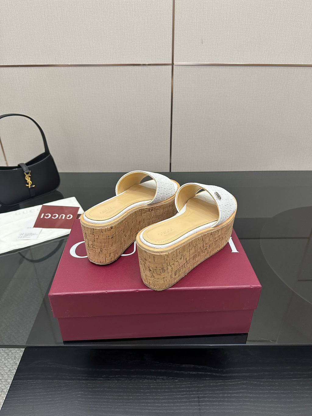 Gucci women's platform slide sandals, white upper, cork wedge; heel view