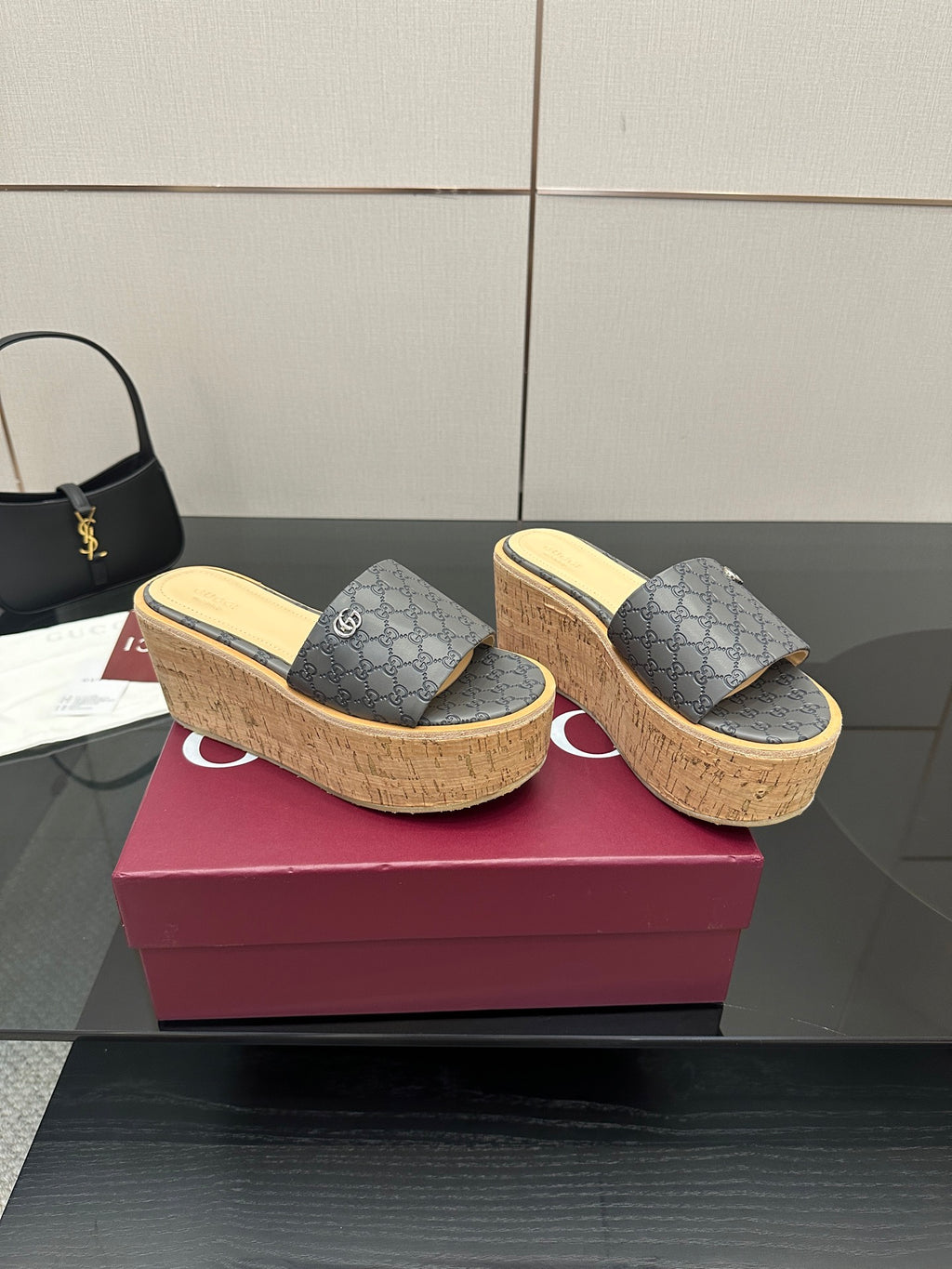 Gucci women’s platform slides, gray GG canvas uppers with cork wedge sole