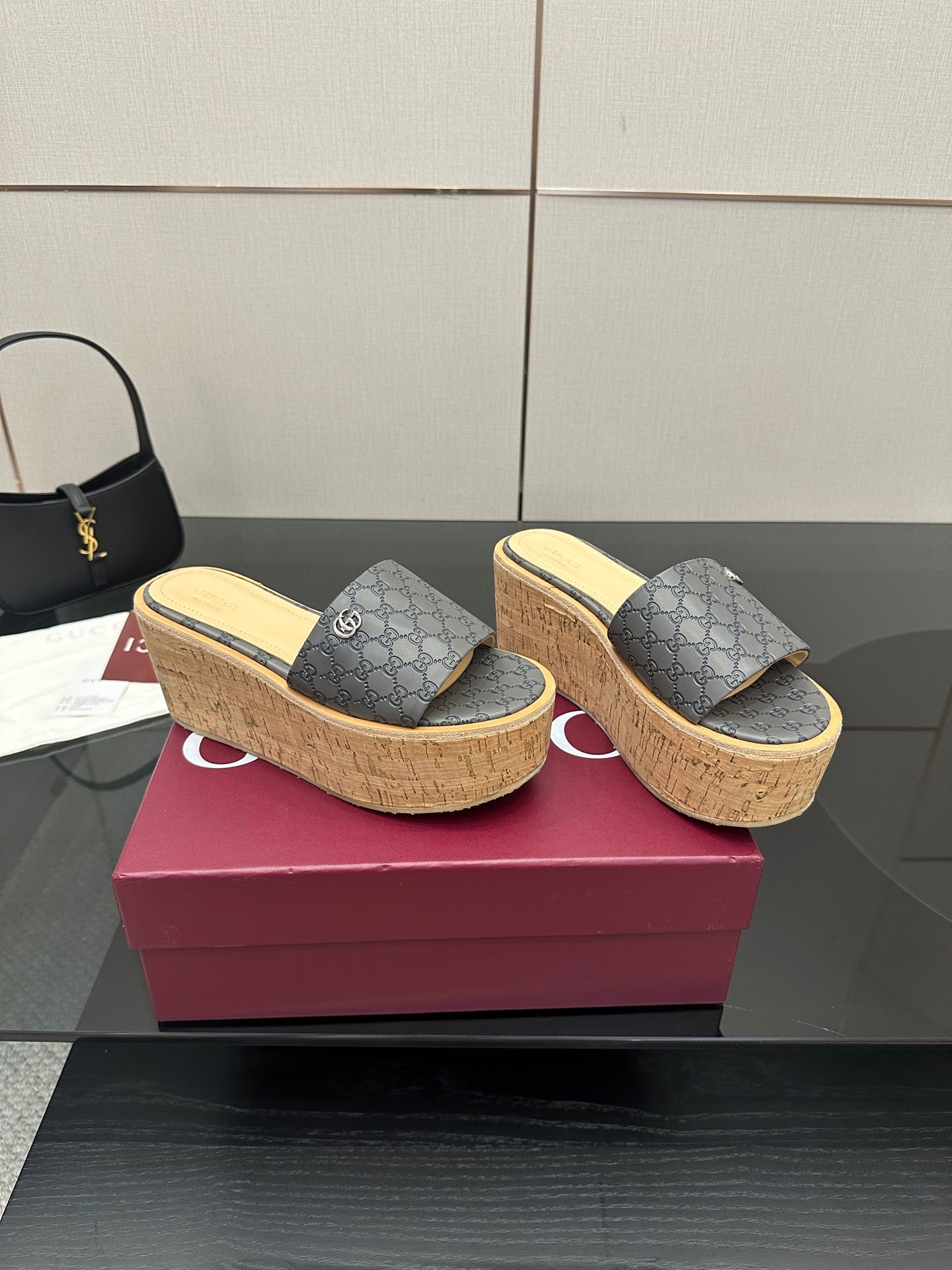 Gucci women’s platform slides, gray GG canvas uppers with cork wedge sole